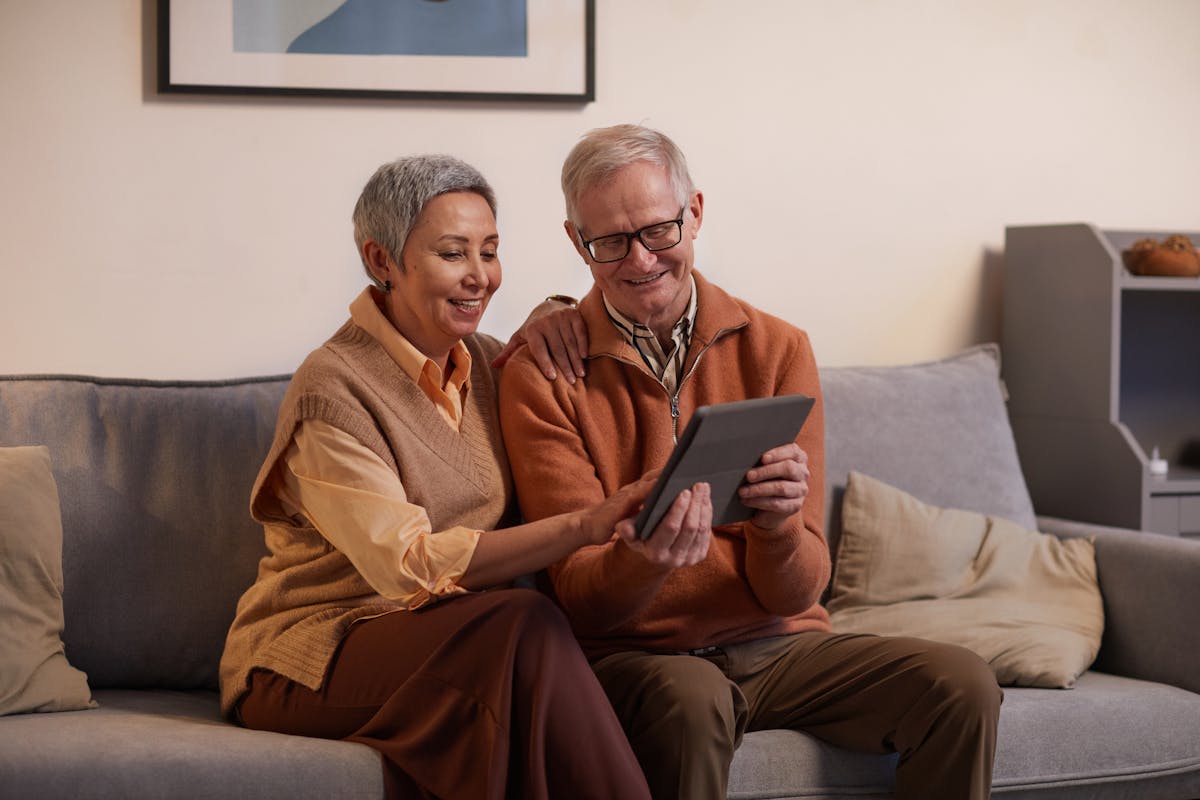 Happy elderly couple walking together